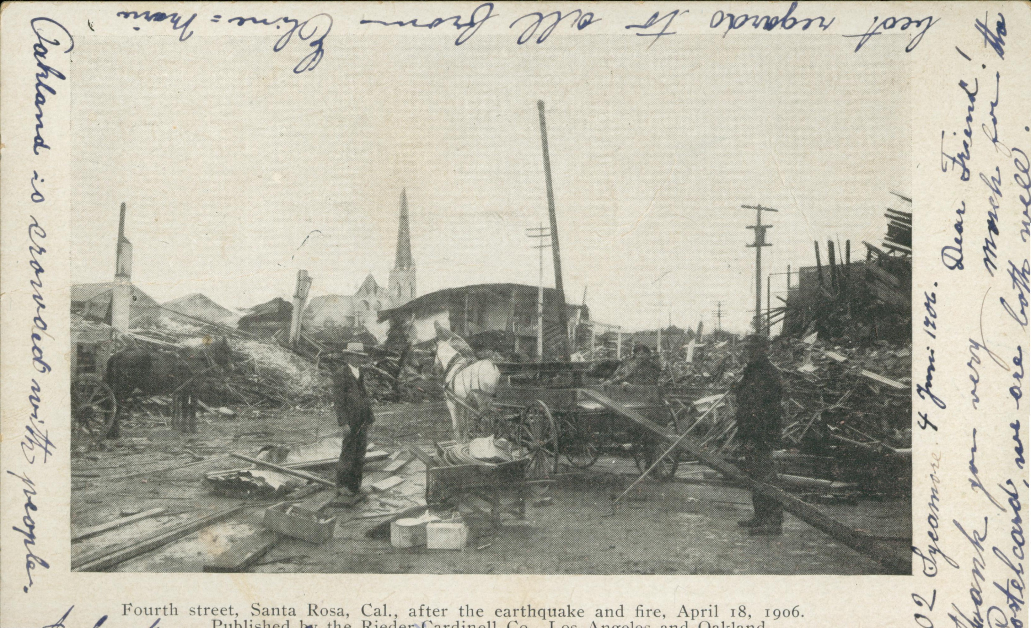 Shows the ruins of 4th street in Santa Rosa after the San Francisco Earthquake. Several men and carts are also in the scene.